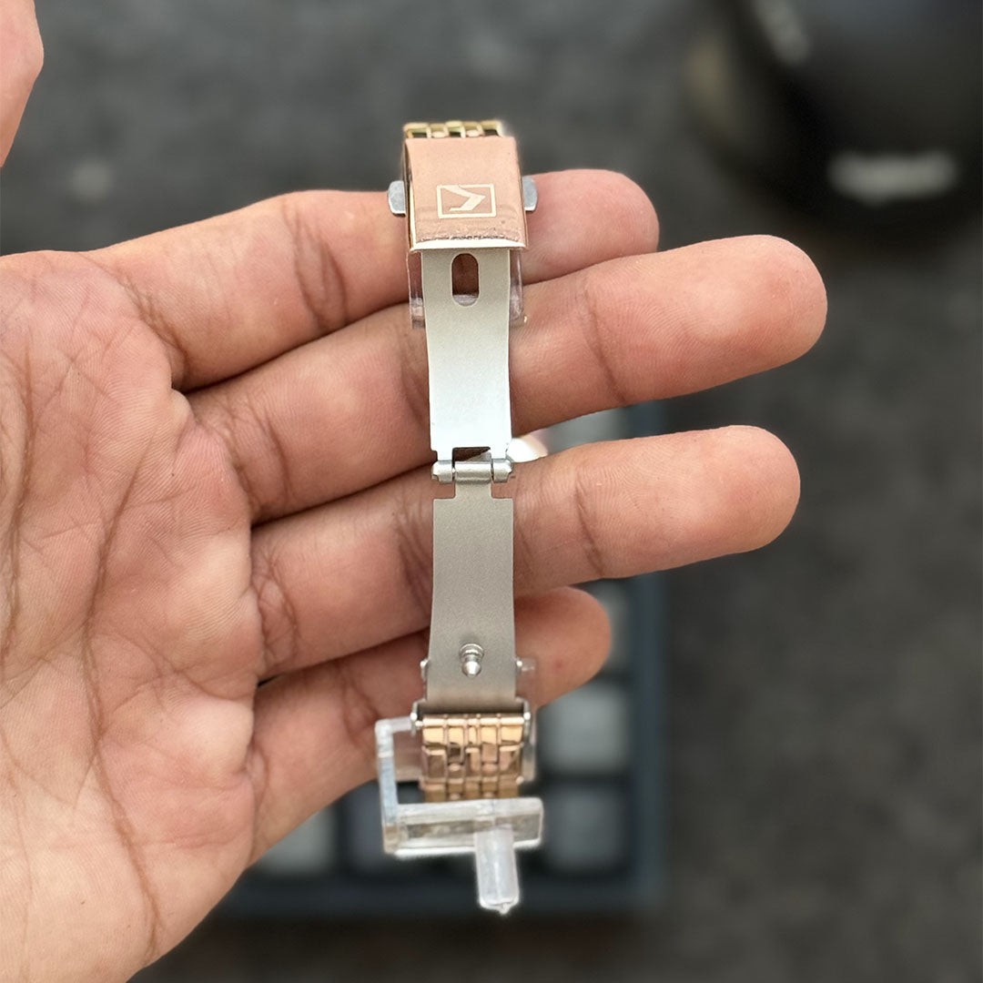 Foto real atras abierto reloj oro rosa azul Curren para mujer