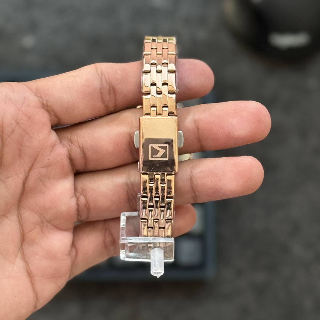 Foto real atras reloj oro rosa azul Curren para mujer