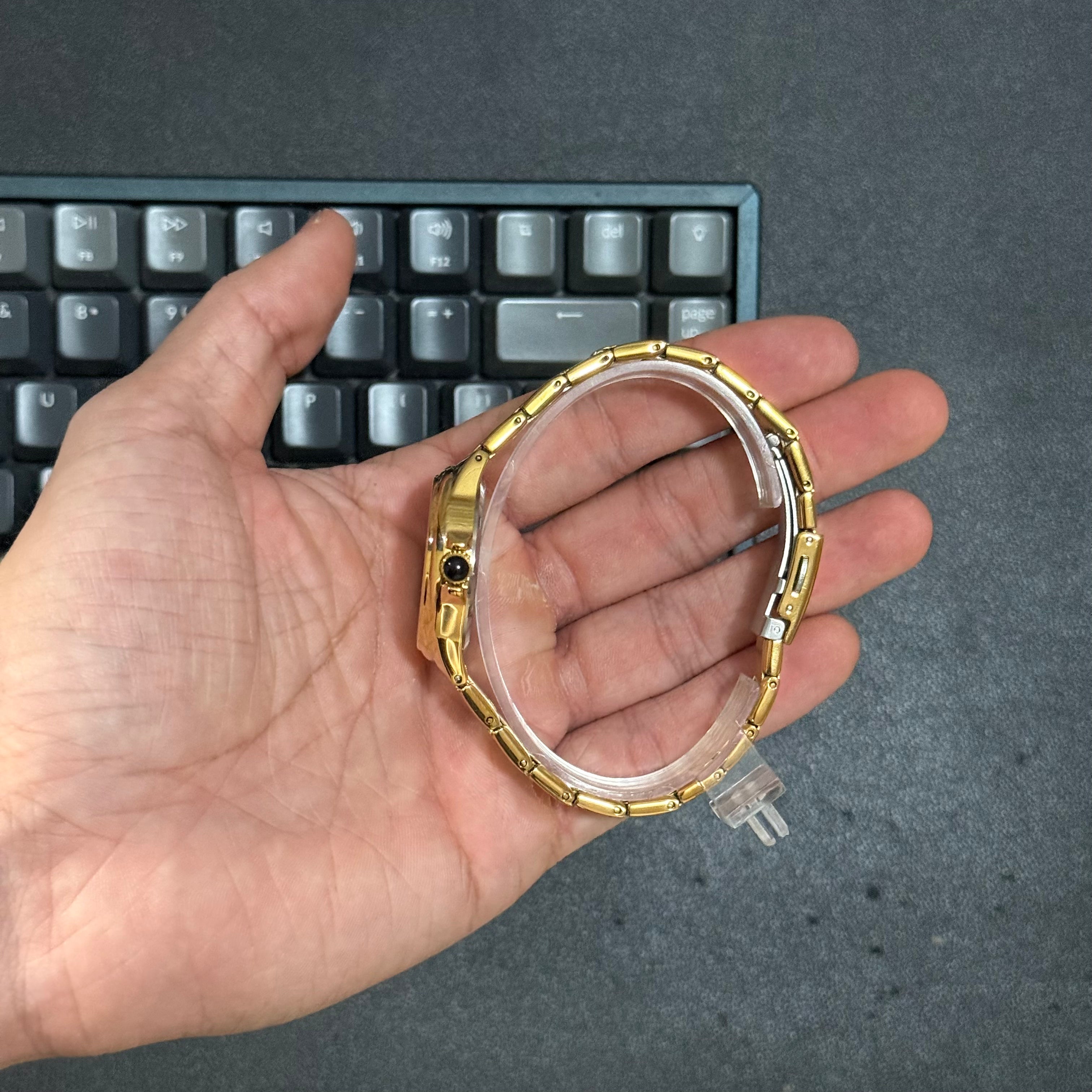 Foto real reloj Curren dorado metal para dama 2