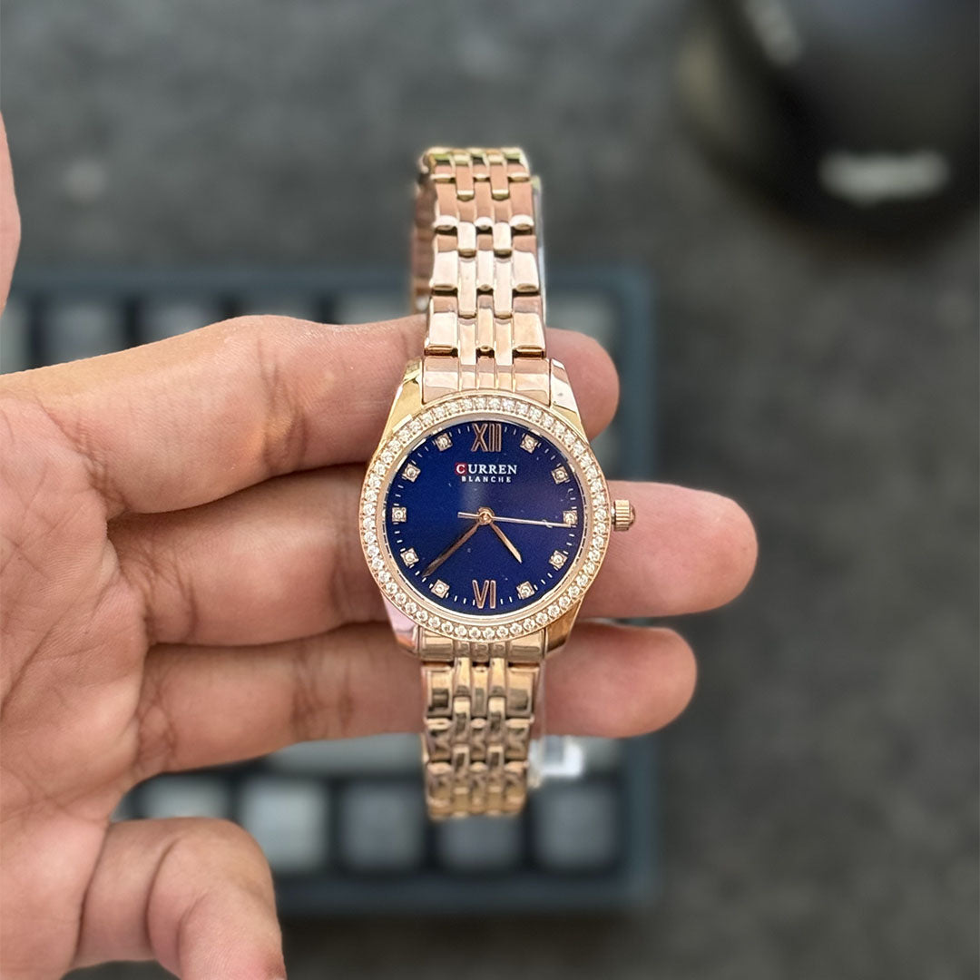 Foto real reloj oro rosa azul Curren para mujer
