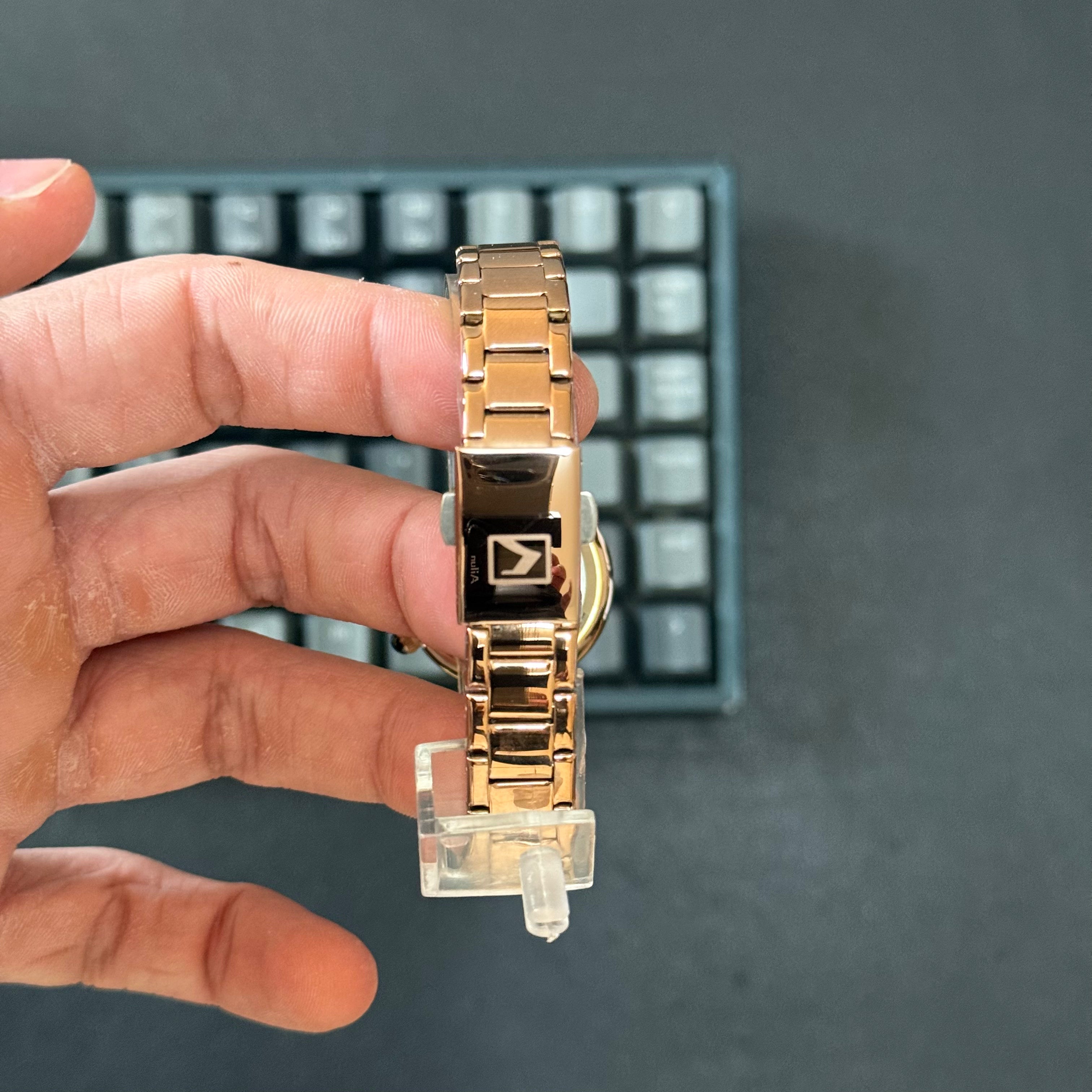 Foto real reves hermoso reloj Curren oro rosa para dama